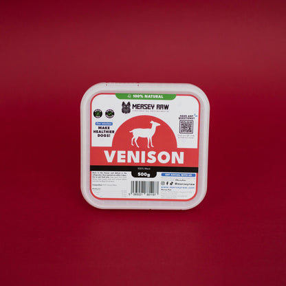 Container of Mersey Raw Venison food for dogs on a red background